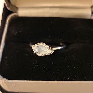 Rough cut, light blue sapphire ring